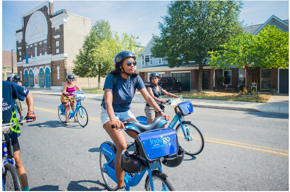 Waffiyyah leading a group ride on Indego bike share bikes