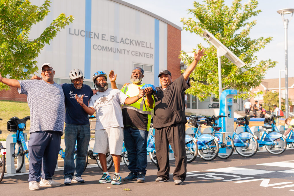 Group of excited seniors after riding bike share